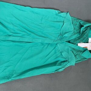 Green Sleeveless Blouse with Lace Detail